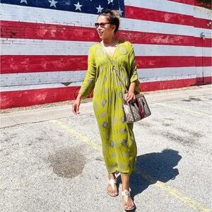 V-neck dress with long sleeves Bead appliqués Back tie closure Size XS